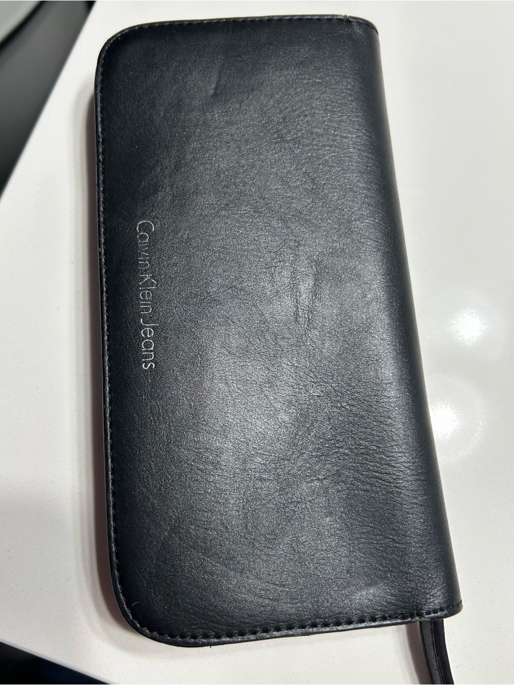 Calvin Klein Black Leather Wallet Phone Case with Gold Buttons